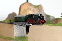 Dampflokomotive mit Waggon